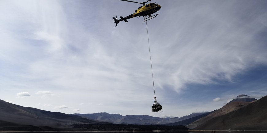Helicopter transport of coring equipment to Laguna Peinado