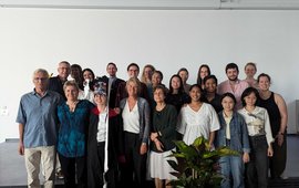 Rey Mourot with the doctoral committee and audience of their PhD defense.