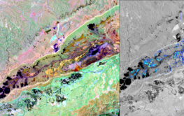 Satelliten-Aufnahme einer Wüstengegend: Bunte Flecke zeigen verschiedene Minerale.