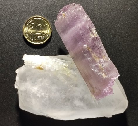 Spodumene, quartz, and elbaite-rossmanite crystals from a pocket in a pegmatite at Paprok, Afghanistan discovered in 2021. The different degree of etching (spodumene is strongly etched, quartz somewhat, tourmaline not) indicates presence of a peralkaline fluid in the late stage of the pegmatite evolution.